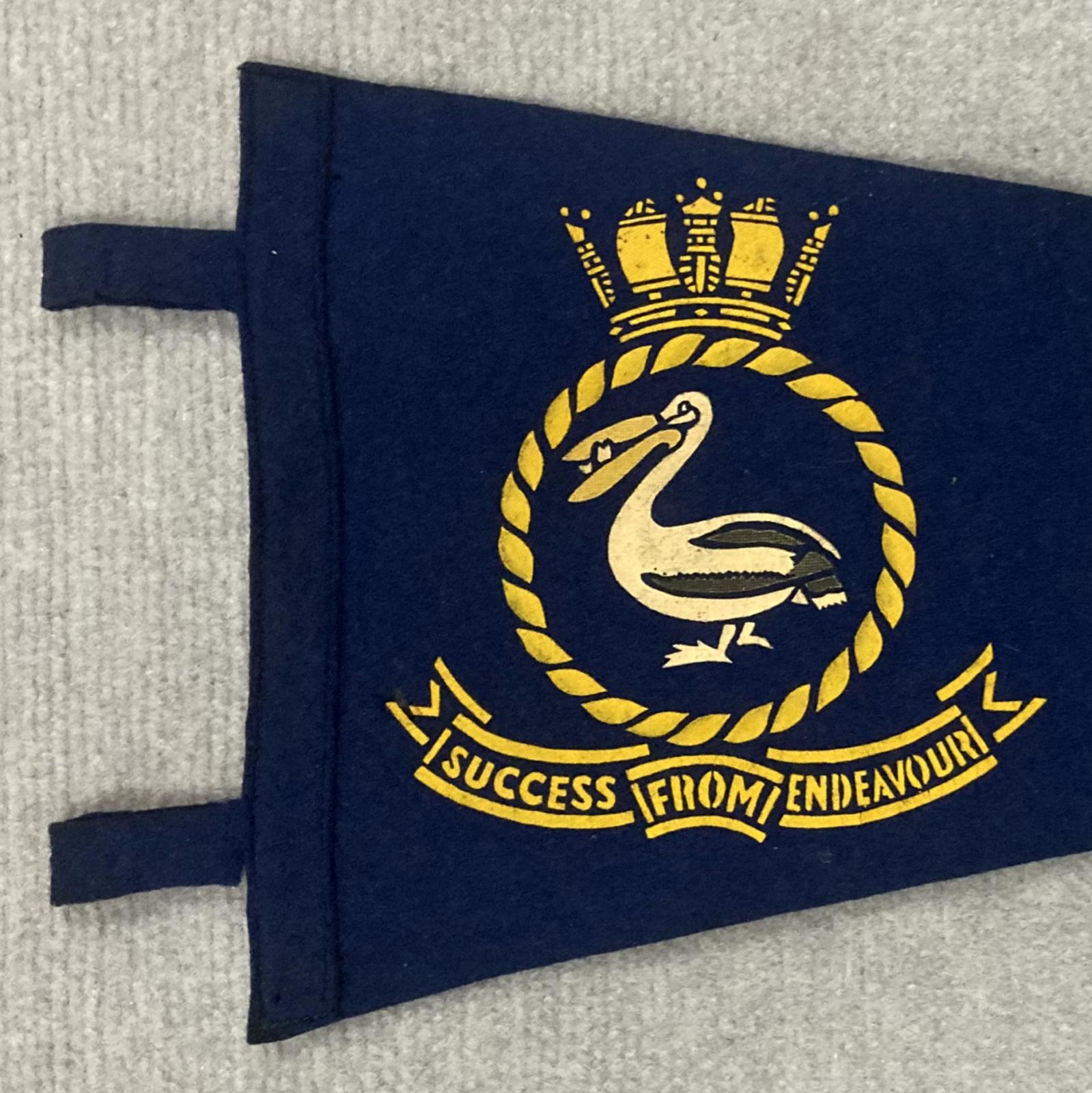 Close up of left end of souvenir felt naval pennant  - HMAS Nirimba