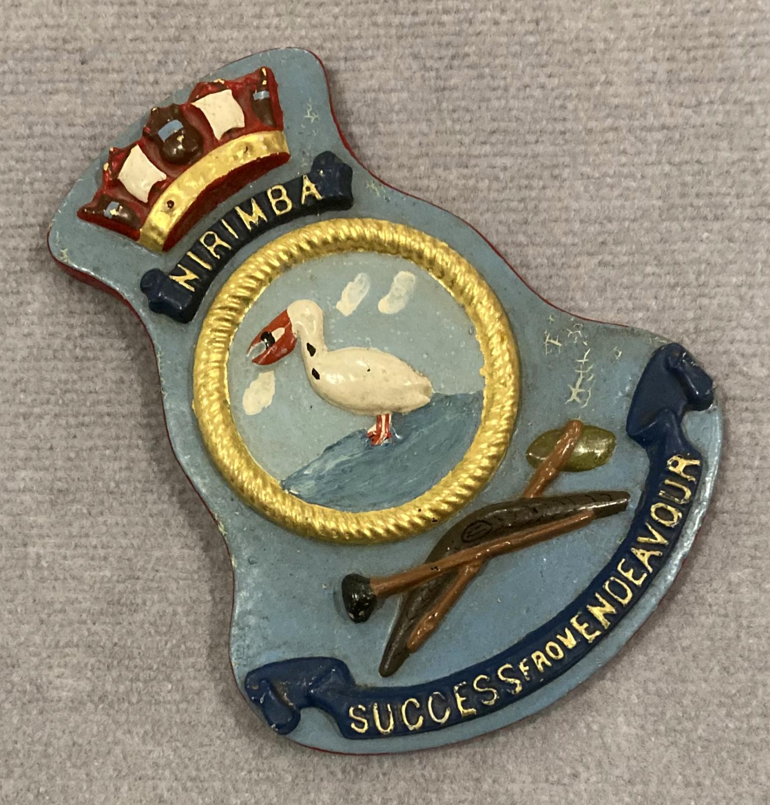 Angled view of commemorative naval plaque and crest - HMAS Nirimba