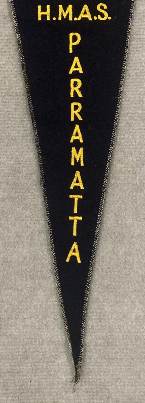 Close up of lower section of souvenir felt naval pennant - HMAS Parramatta