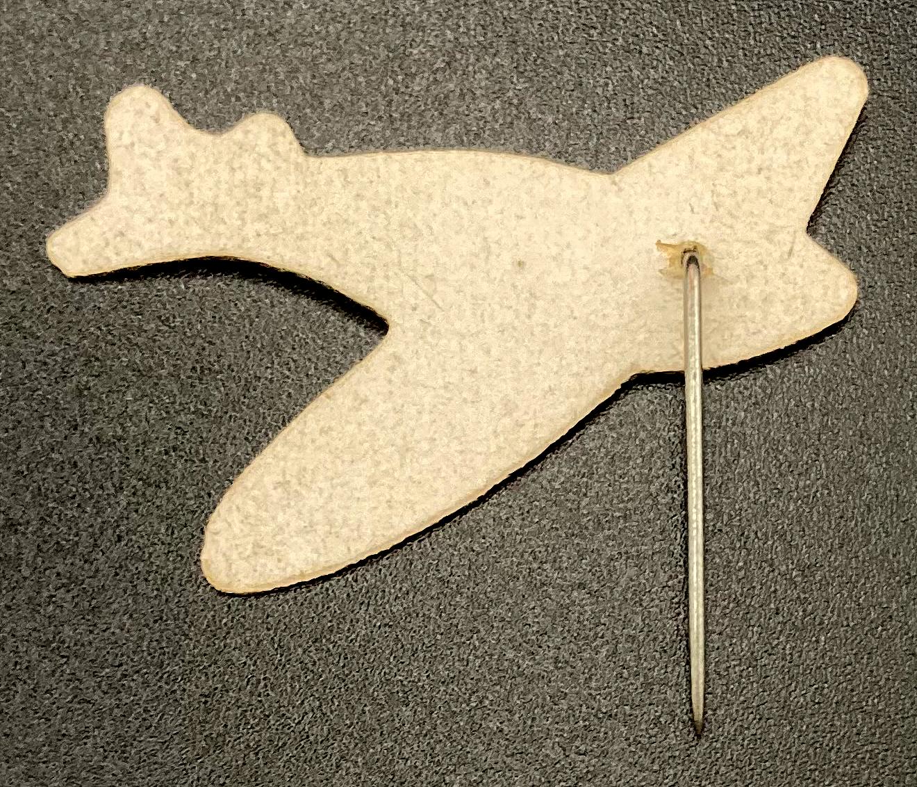 Reverse of Patriotic Carnival celluloid fundraising pin - plane