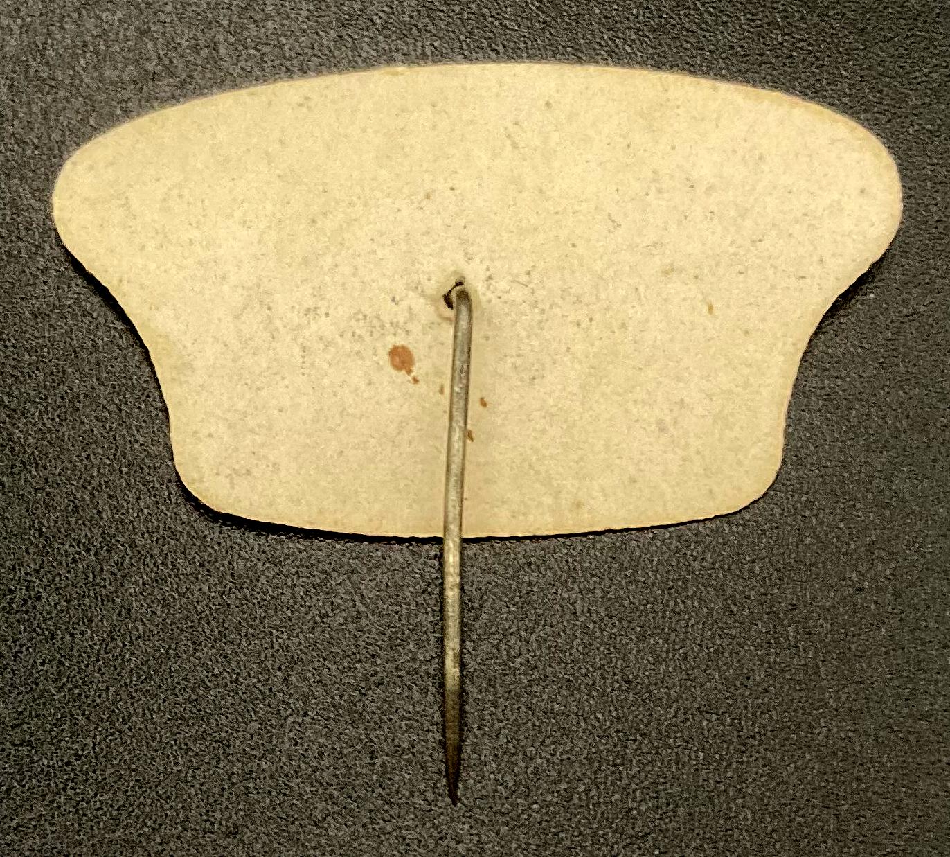 Reverse of H.M.A.S. Sydney celluloid pin - 1