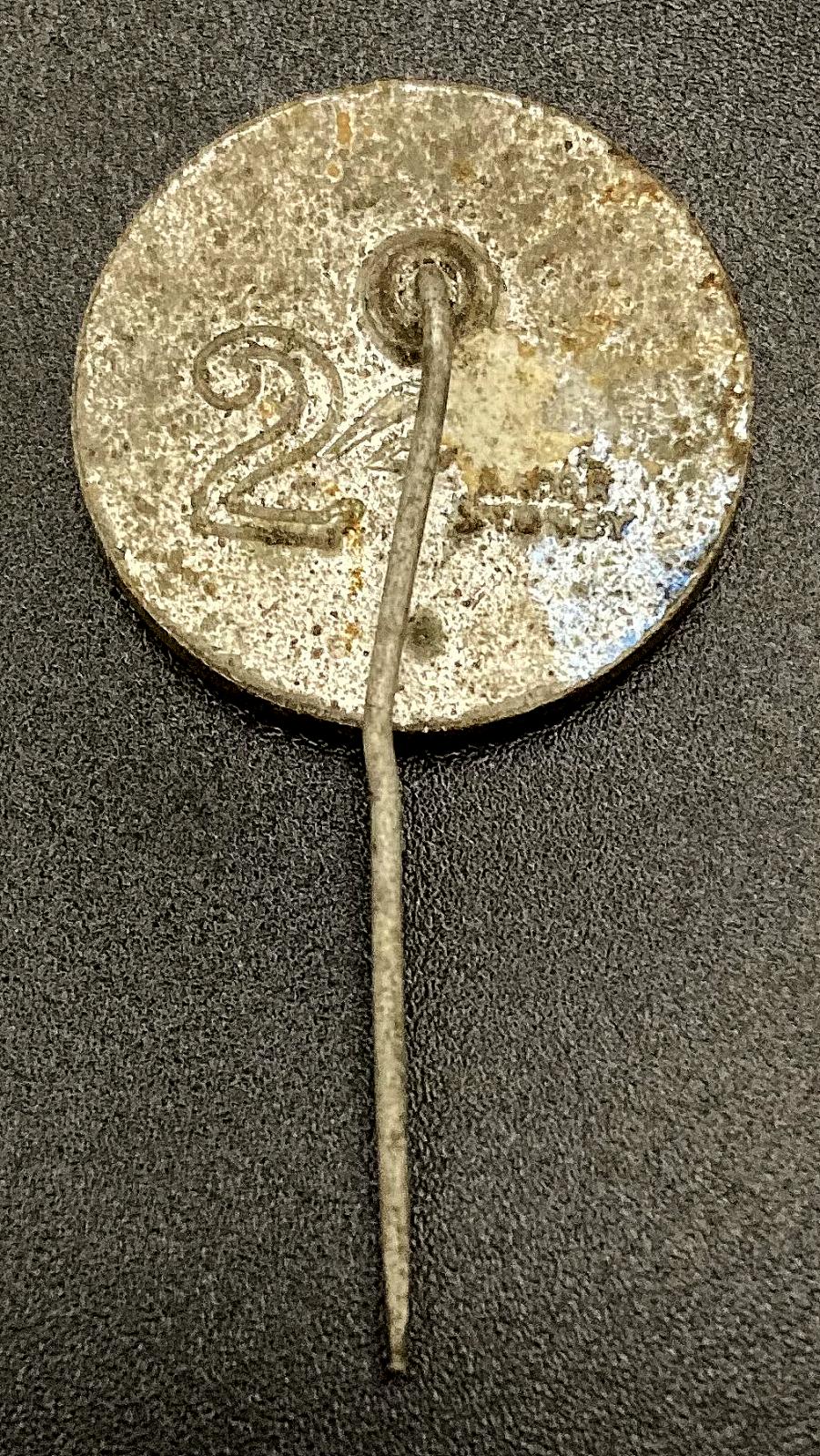 Reverse of Sailors' Day metal fundraising pin - 2 shillings