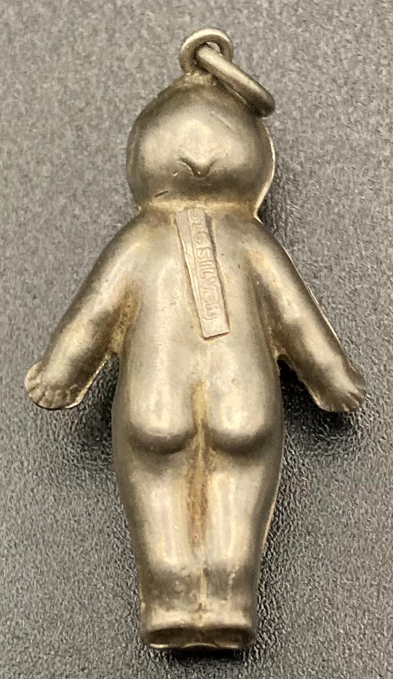 Reverse of sterling silver Fums Up good luck charm