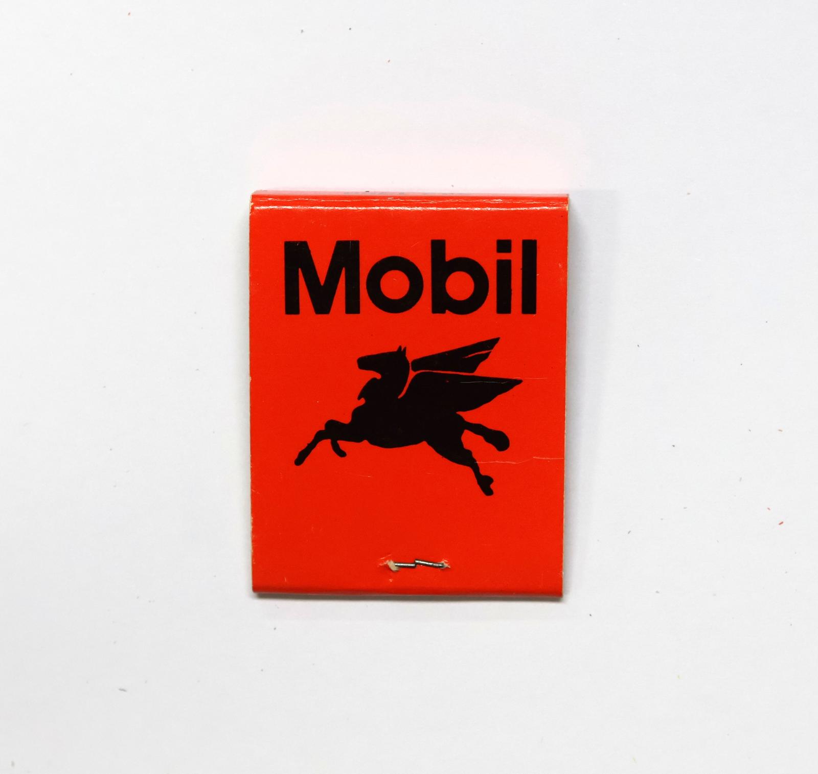 Rectangular shaped matchbook with orange background with black text. The front of the matchbook has text and the back has the silhouette of a Pegasus. 