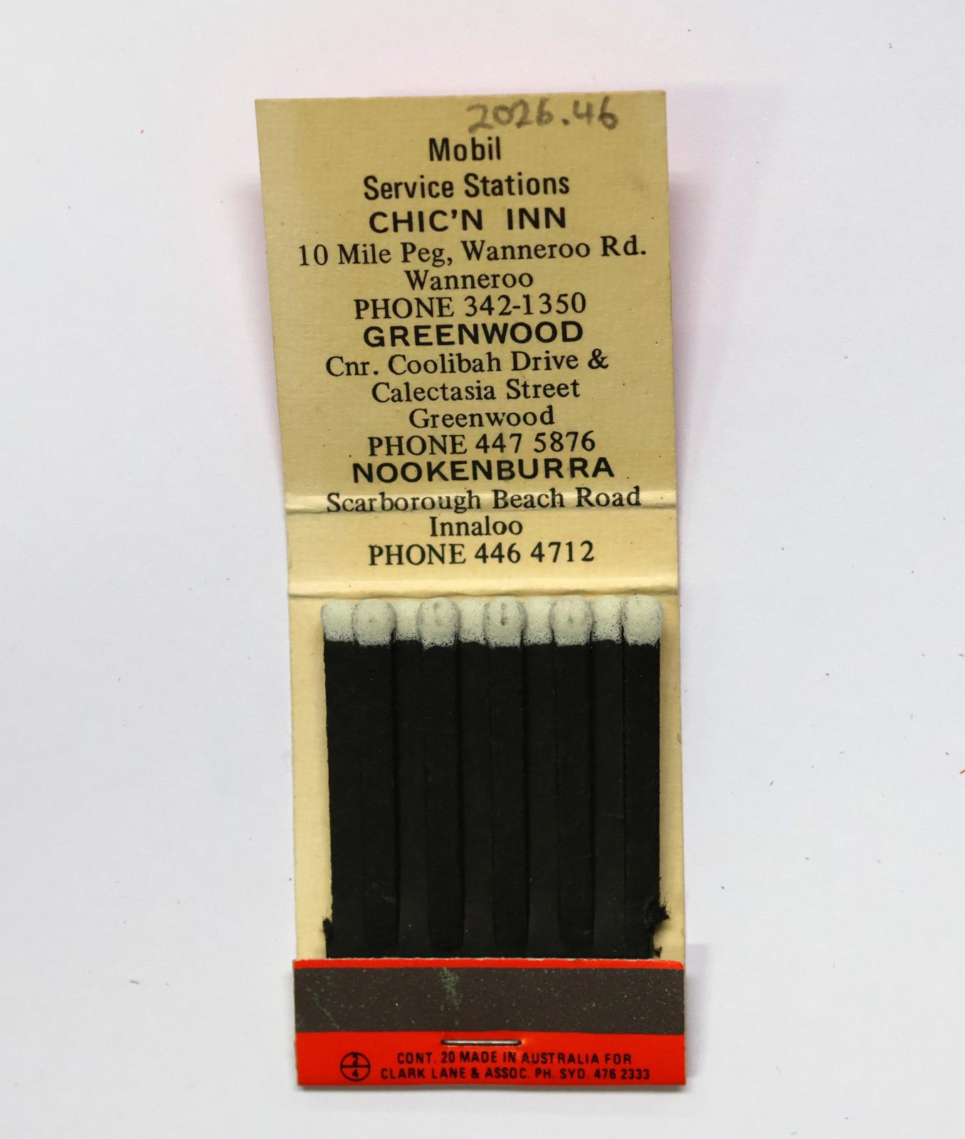 The inside has 20 black matchsticks with white match heads.