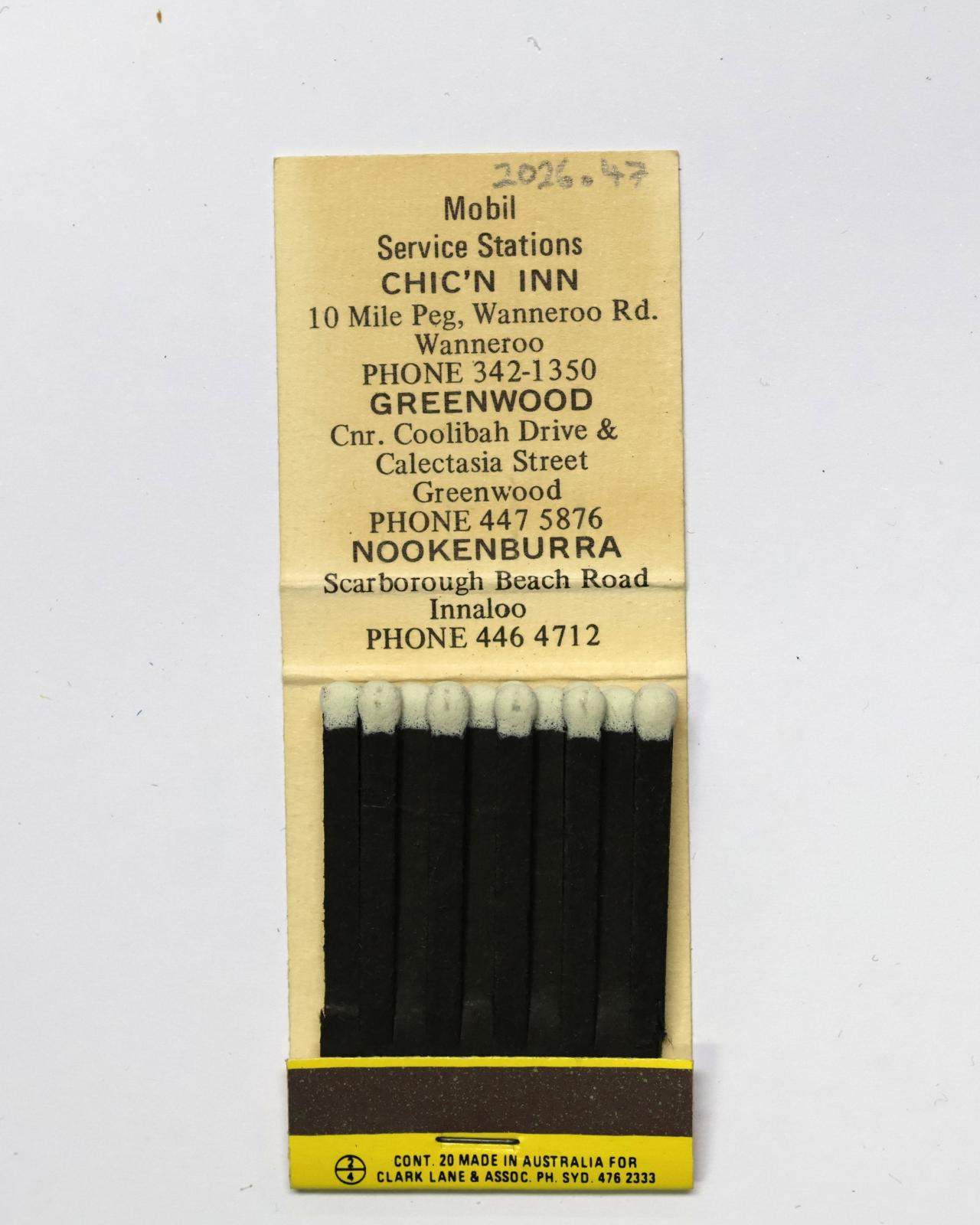 The inside has 20 black matchsticks with white match heads.
