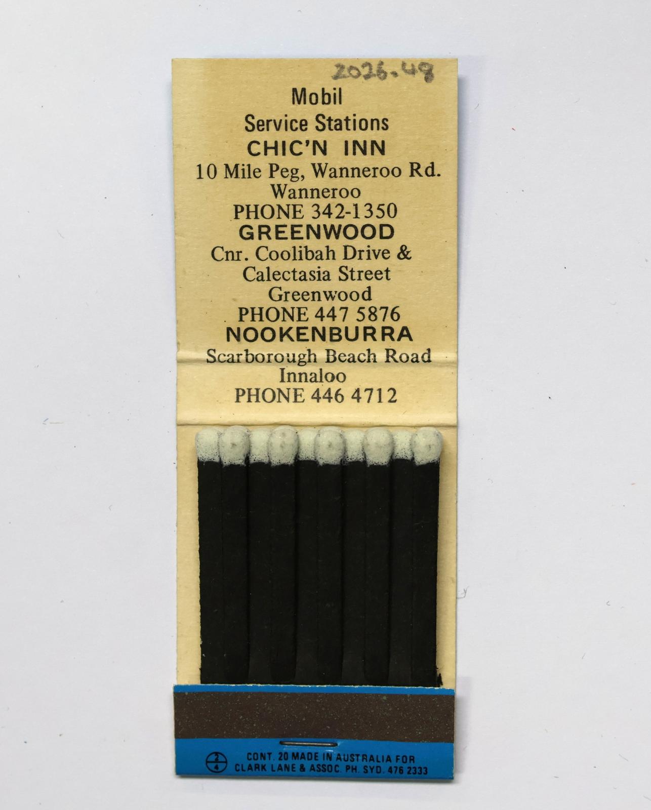 The inside has 20 black matchsticks with white match heads.