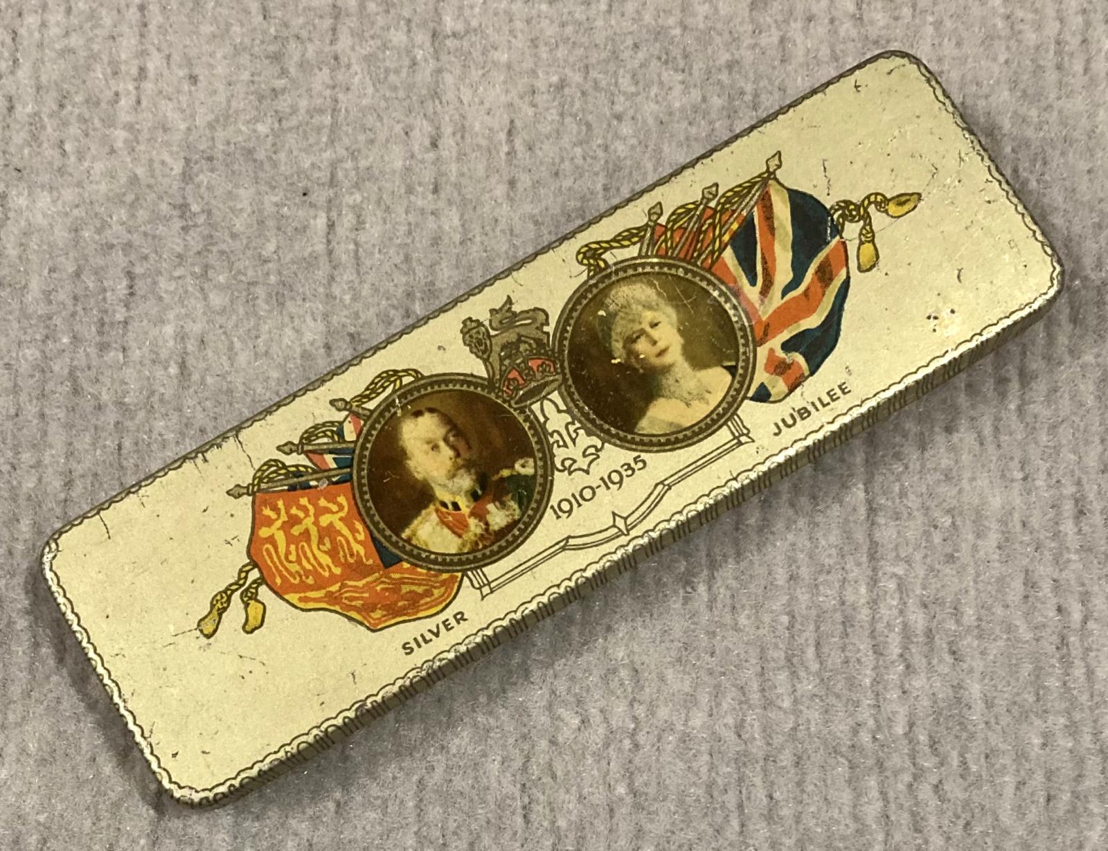 Angled view of commemorative chocolate tin - Silver Jubilee of King George V and Queen Mary (1910–1935)