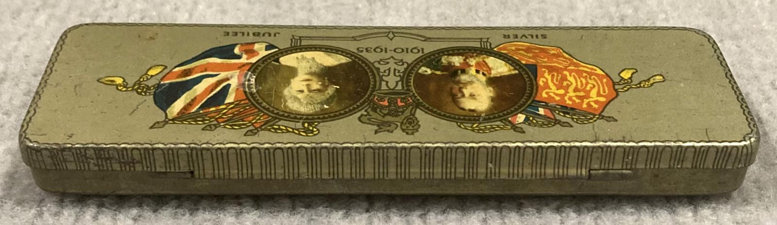 Oblique view from back of commemorative chocolate tin - Silver Jubilee of King George V and Queen Mary (1910–1935)