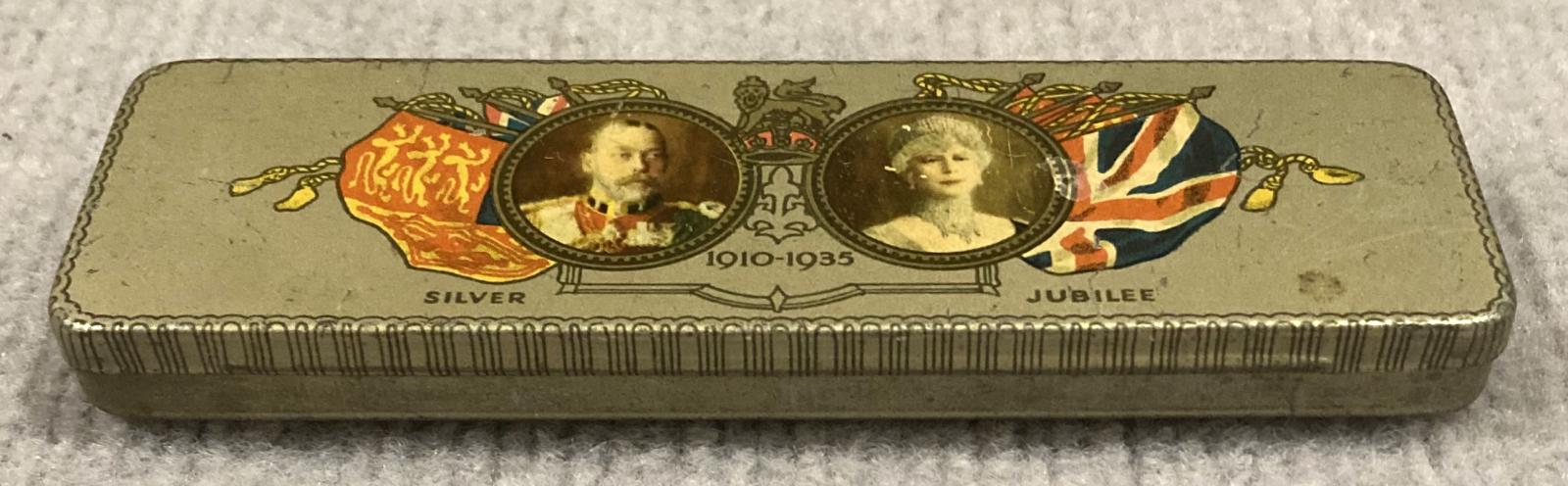 Oblique view from front of commemorative chocolate tin - Silver Jubilee of King George V and Queen Mary (1910–1935)