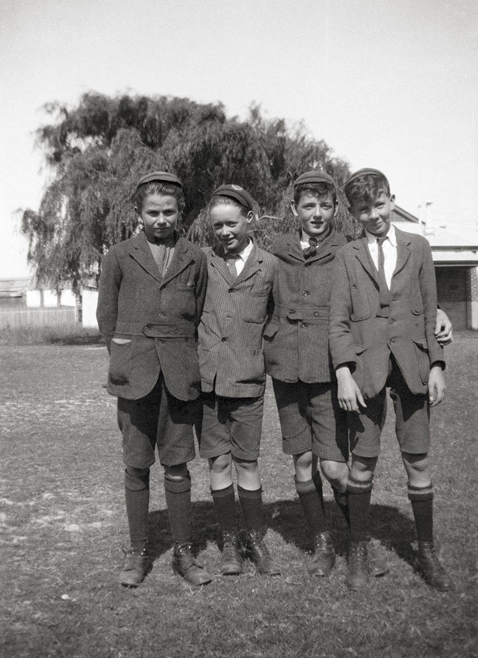 A group of four students in front of the Bunbury District High School Home Science Centre.