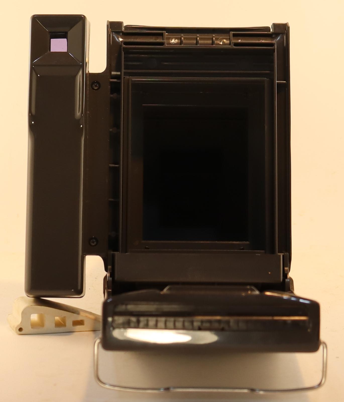 Back open view of Polaroid Portrait Land Camera