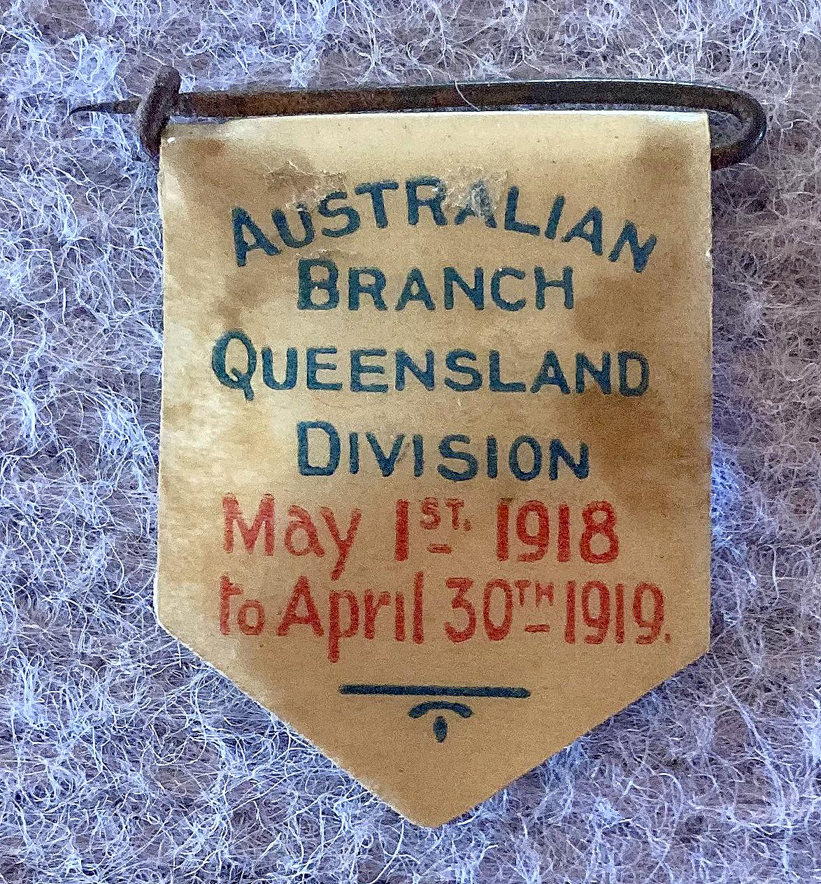 Reverse of Red Cross Society Queensland Division celluloid membership badge