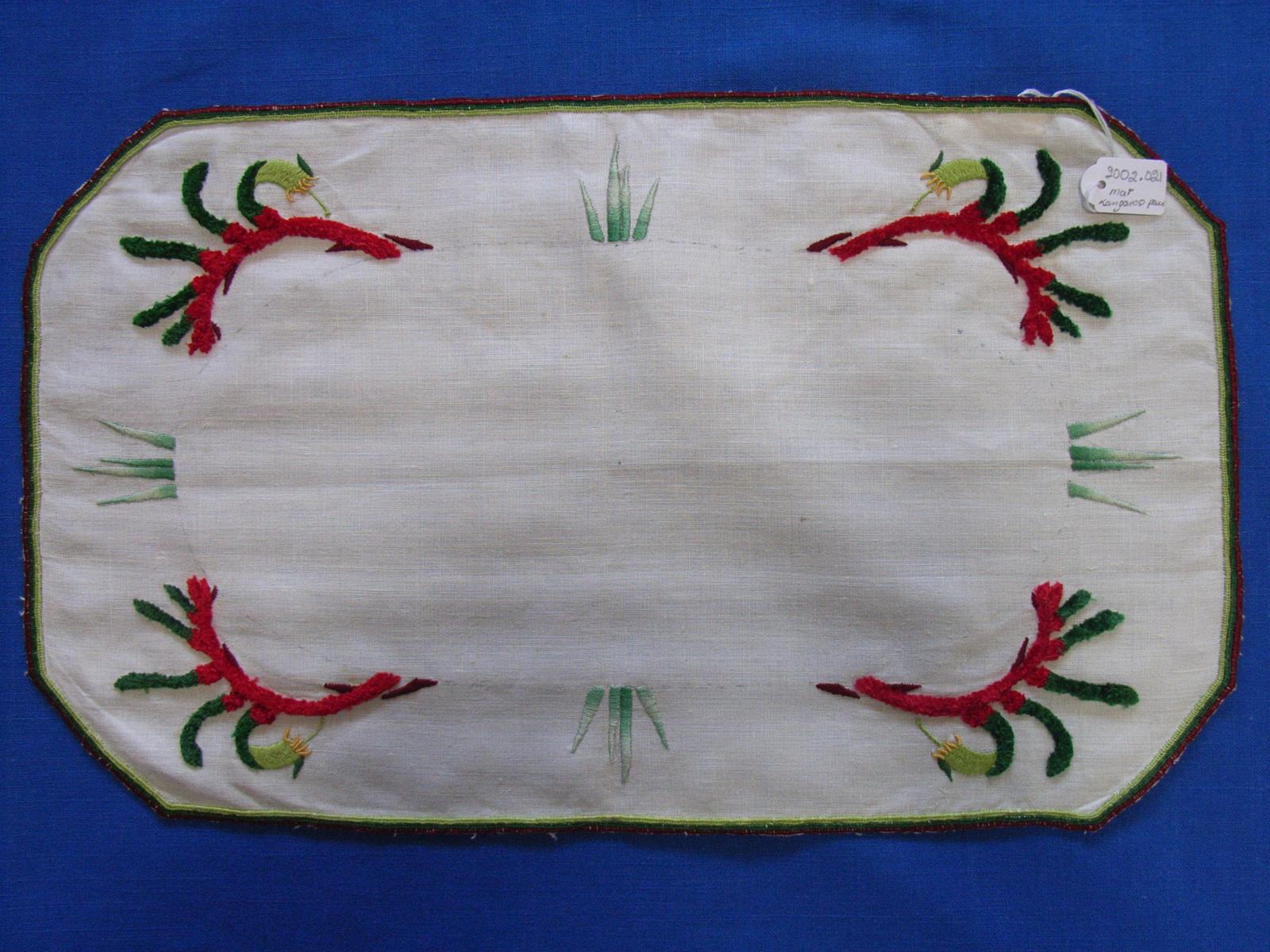 Embroidered mat