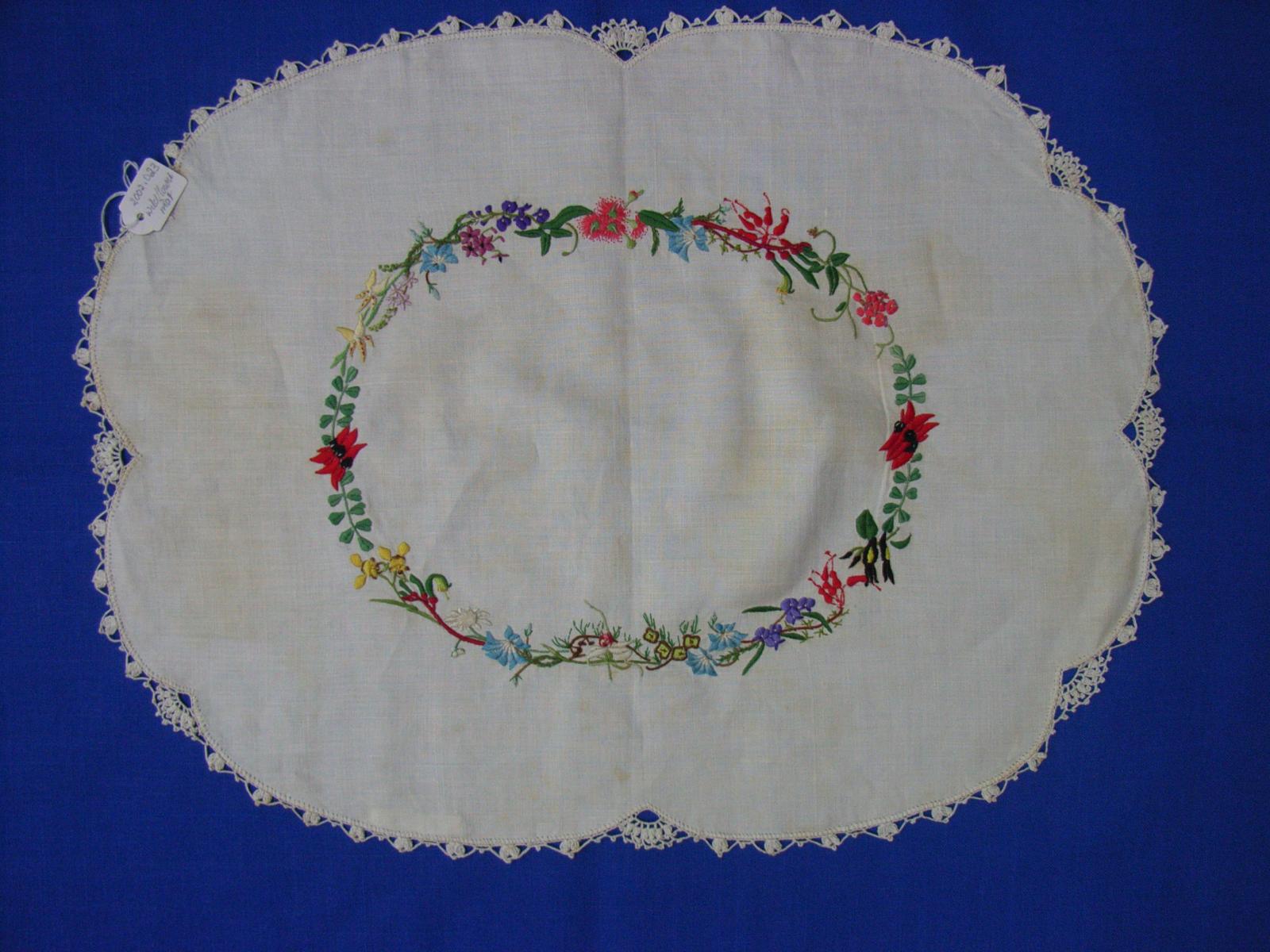 Embroidered mat