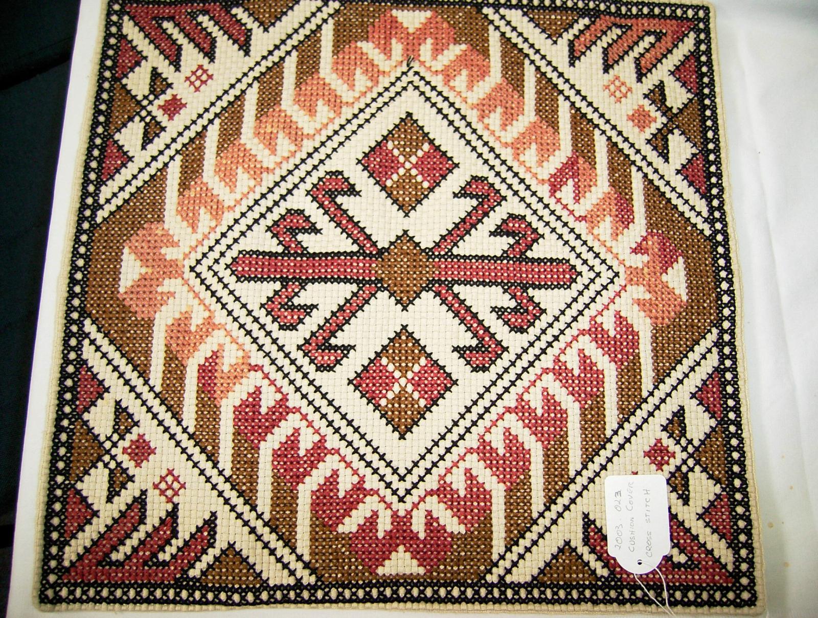 Embroidered cushion cover