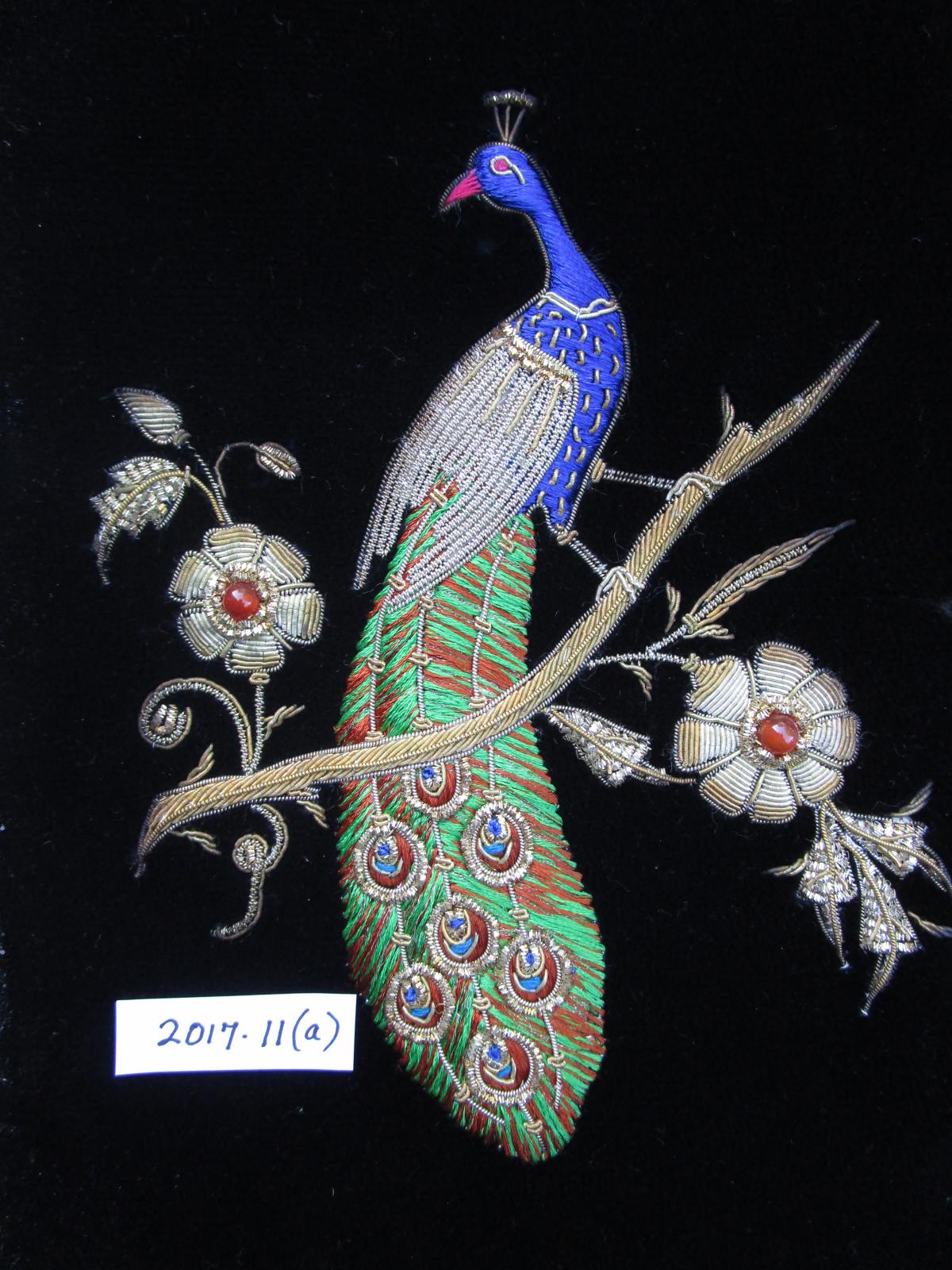 Metal thread picture of peacock