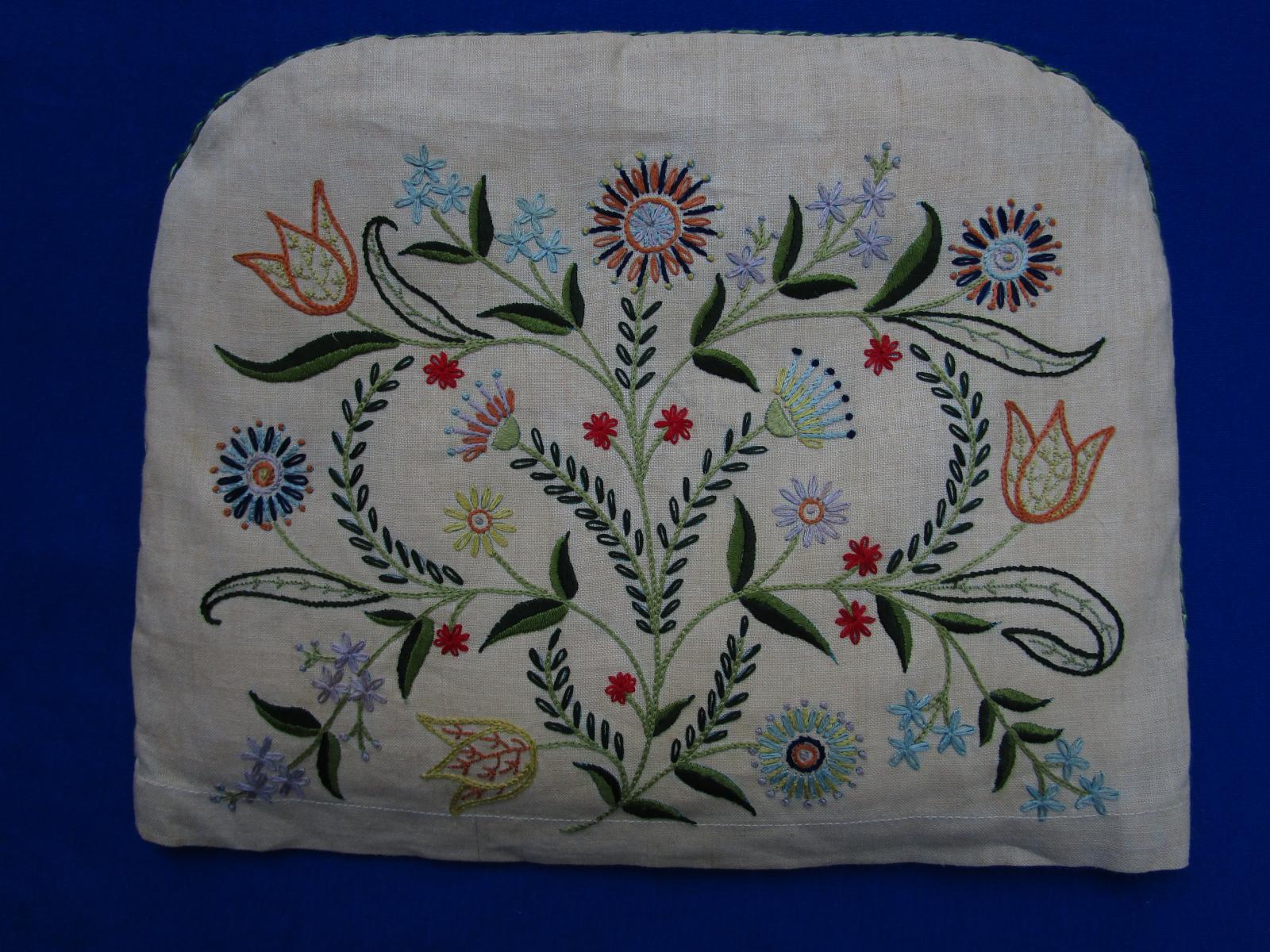 Embroidered tea cosy