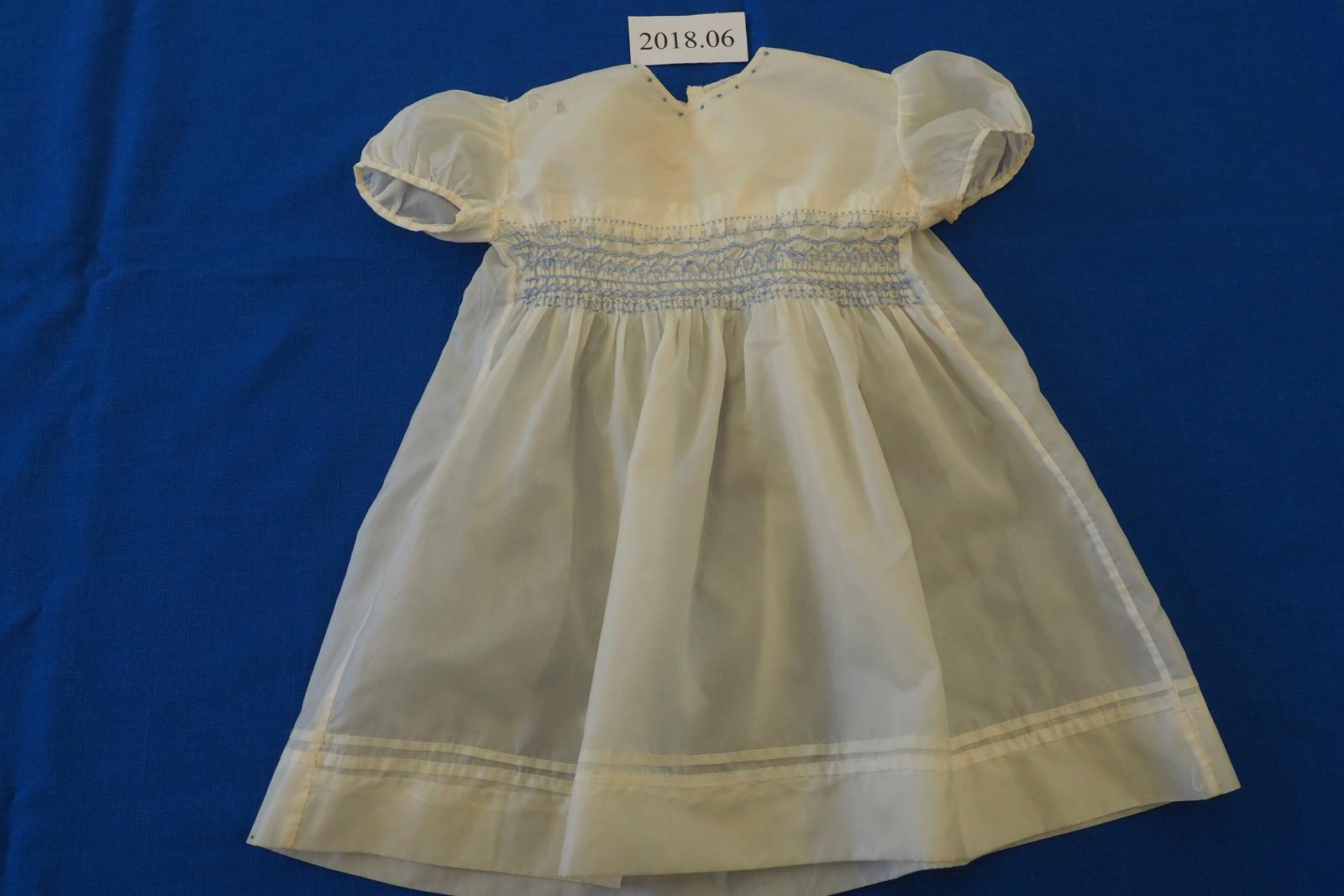 Smocked baby dress in parachute silk