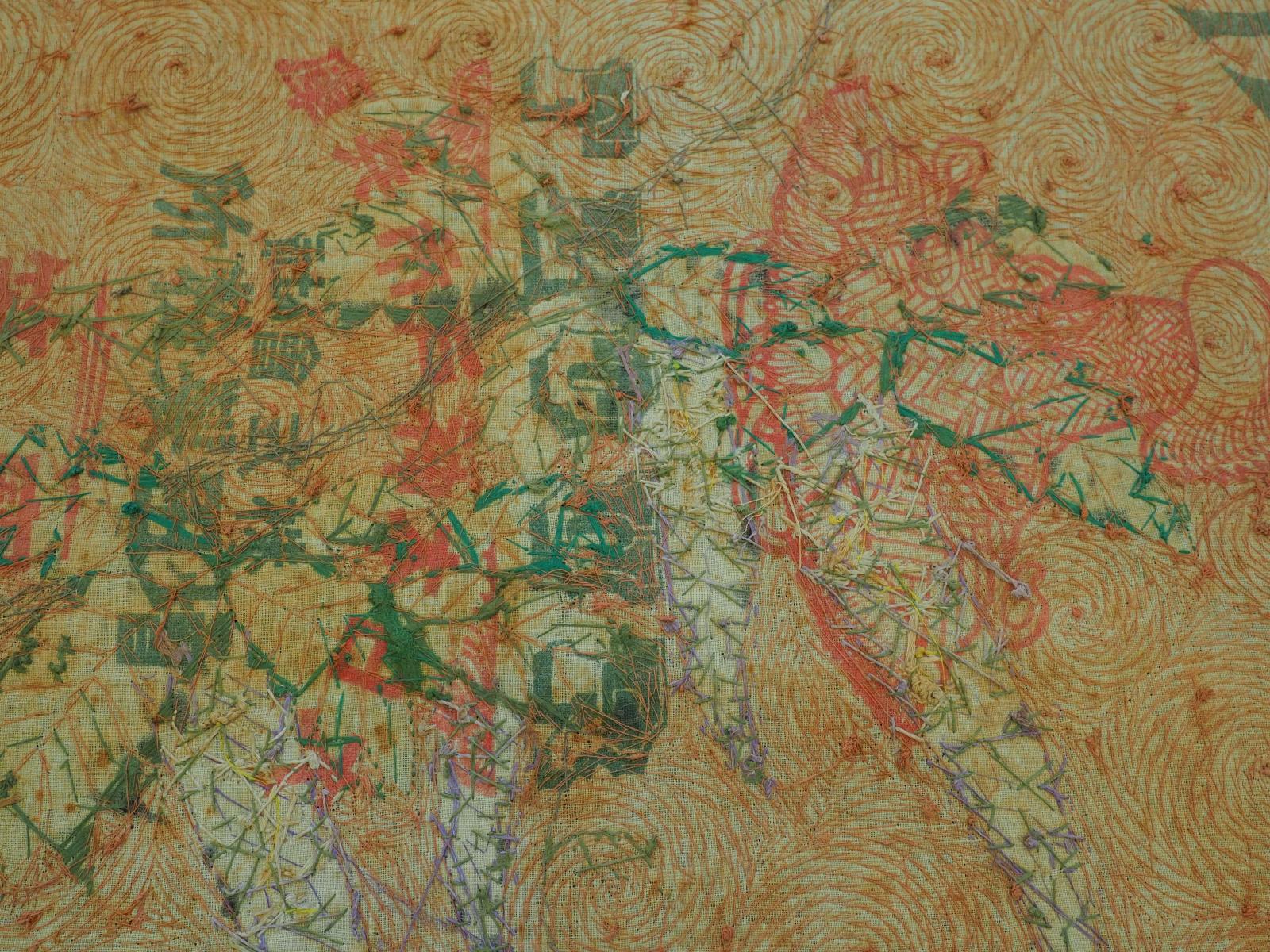 Back detail of metal thread picture