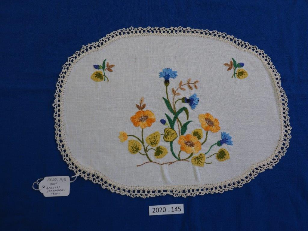 Embroidered mat