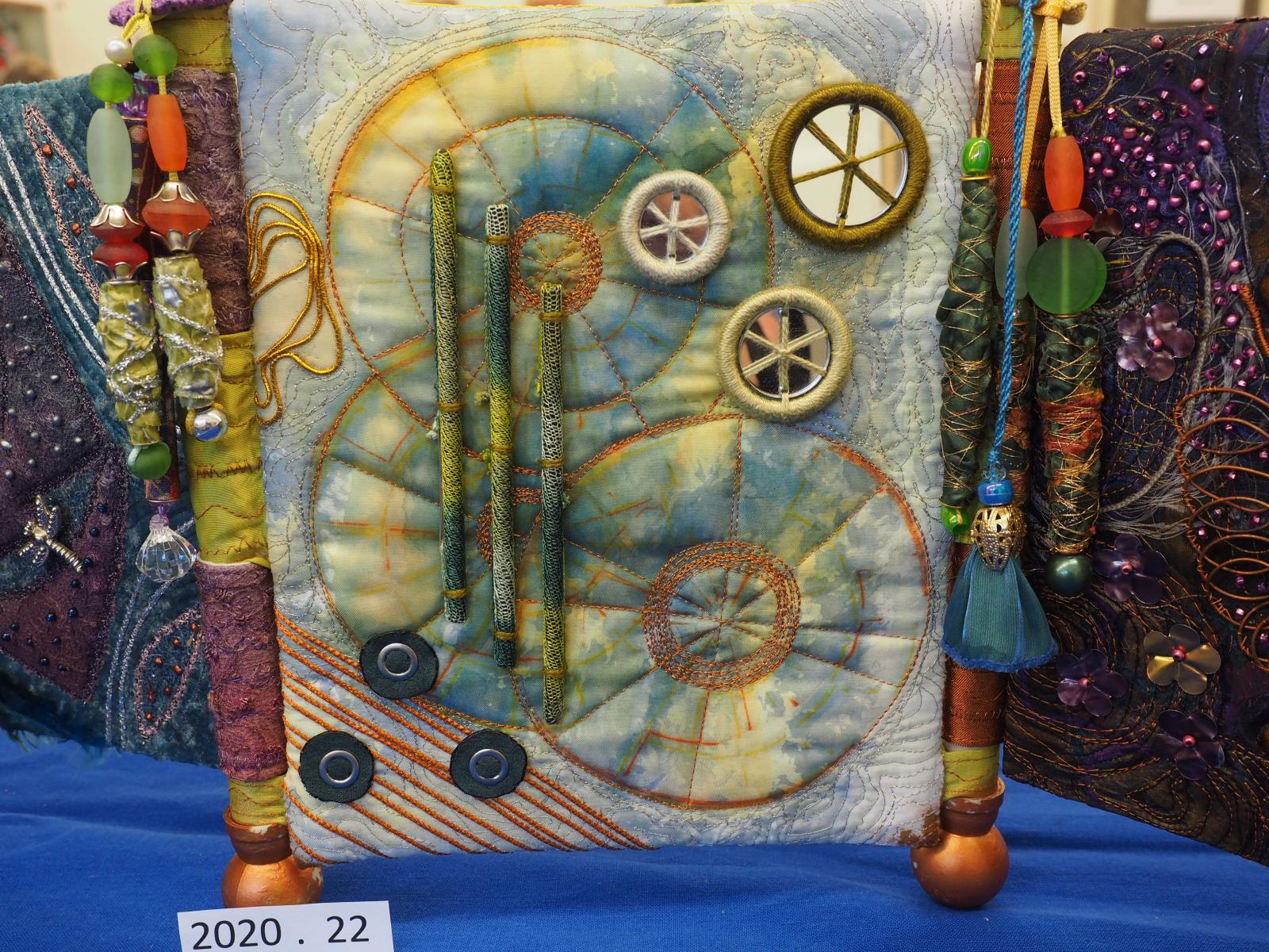 Machine embroidered book page detail