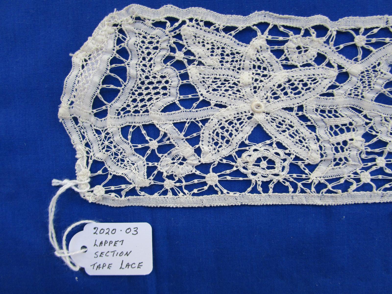 Tape lace lappet end closeup