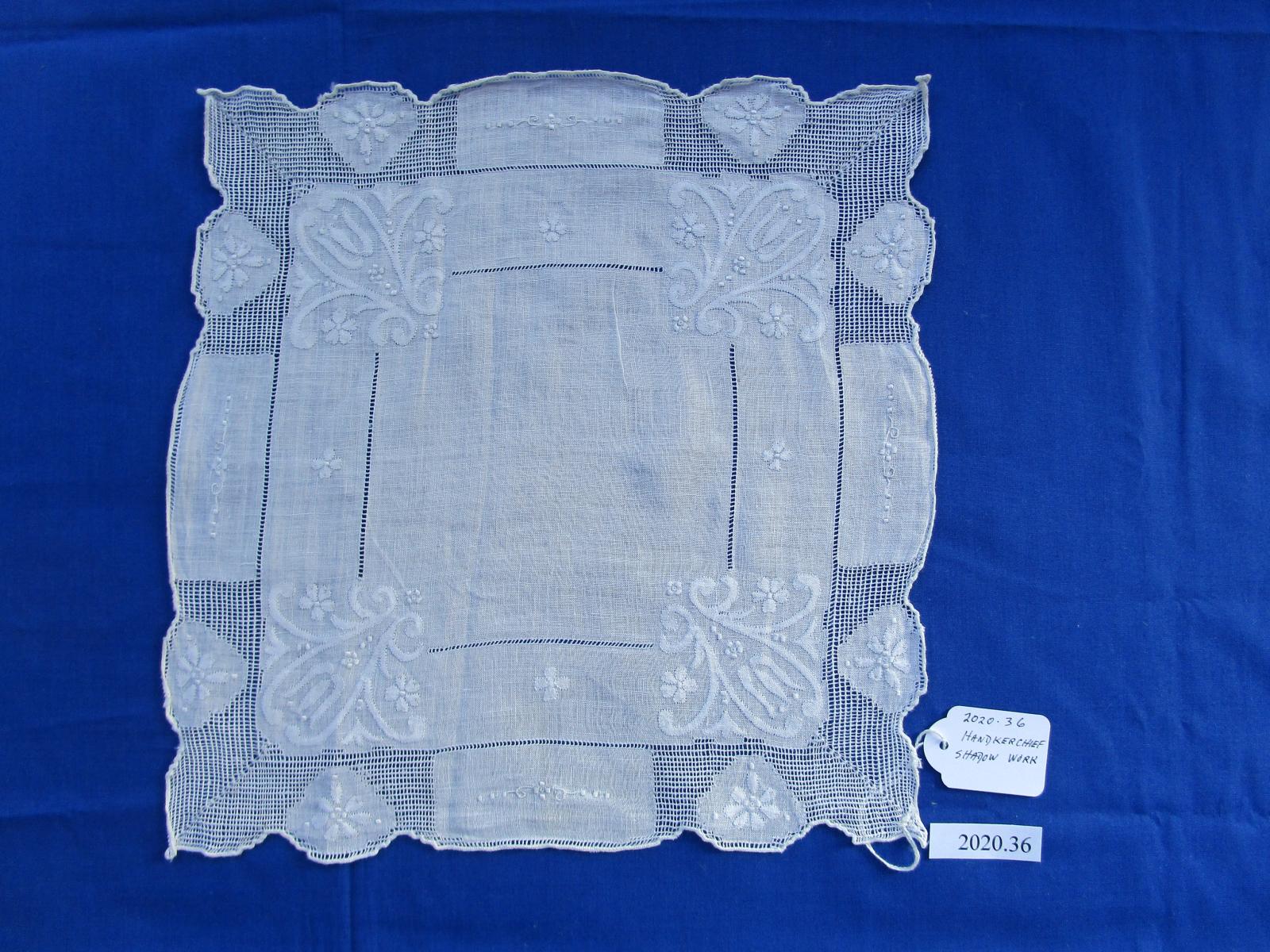 Shadow work and drawn thread handkerchief