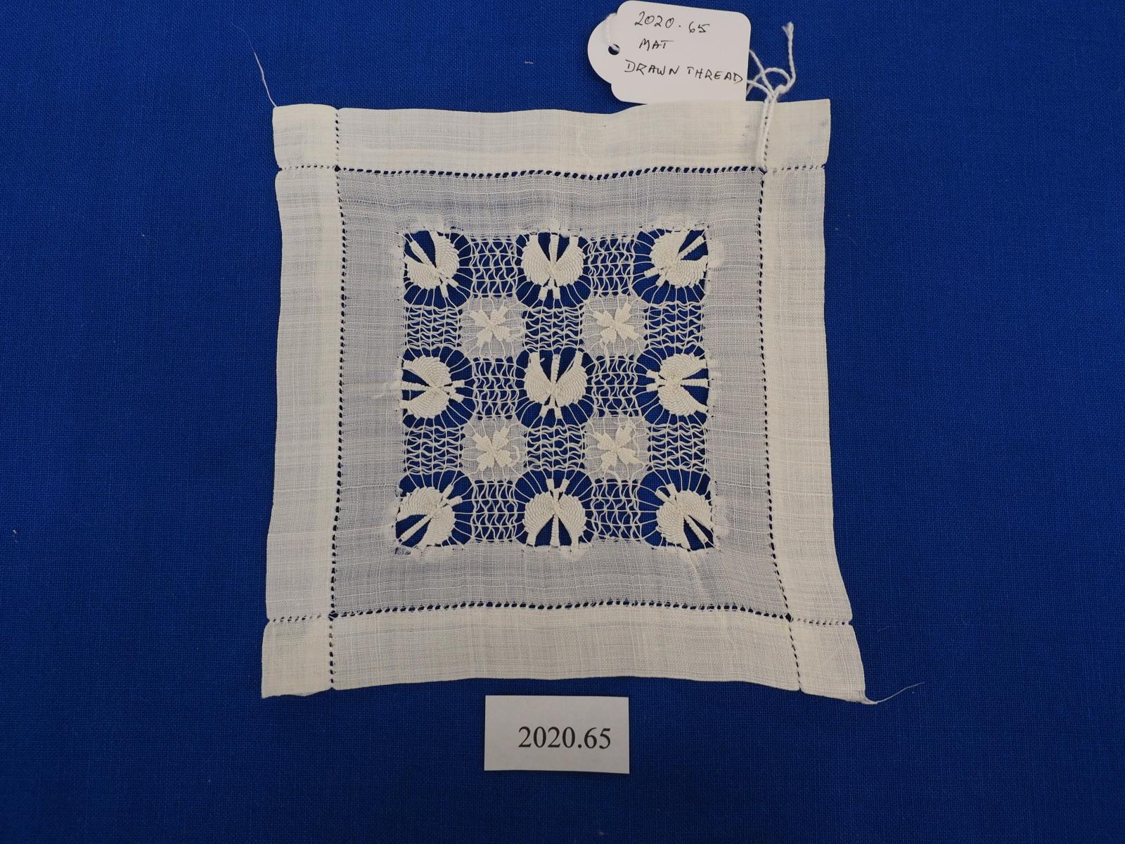 Drawn thread mat
