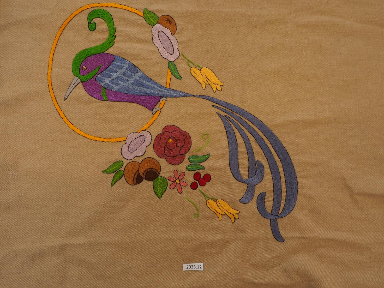 Embroidered cushion cover