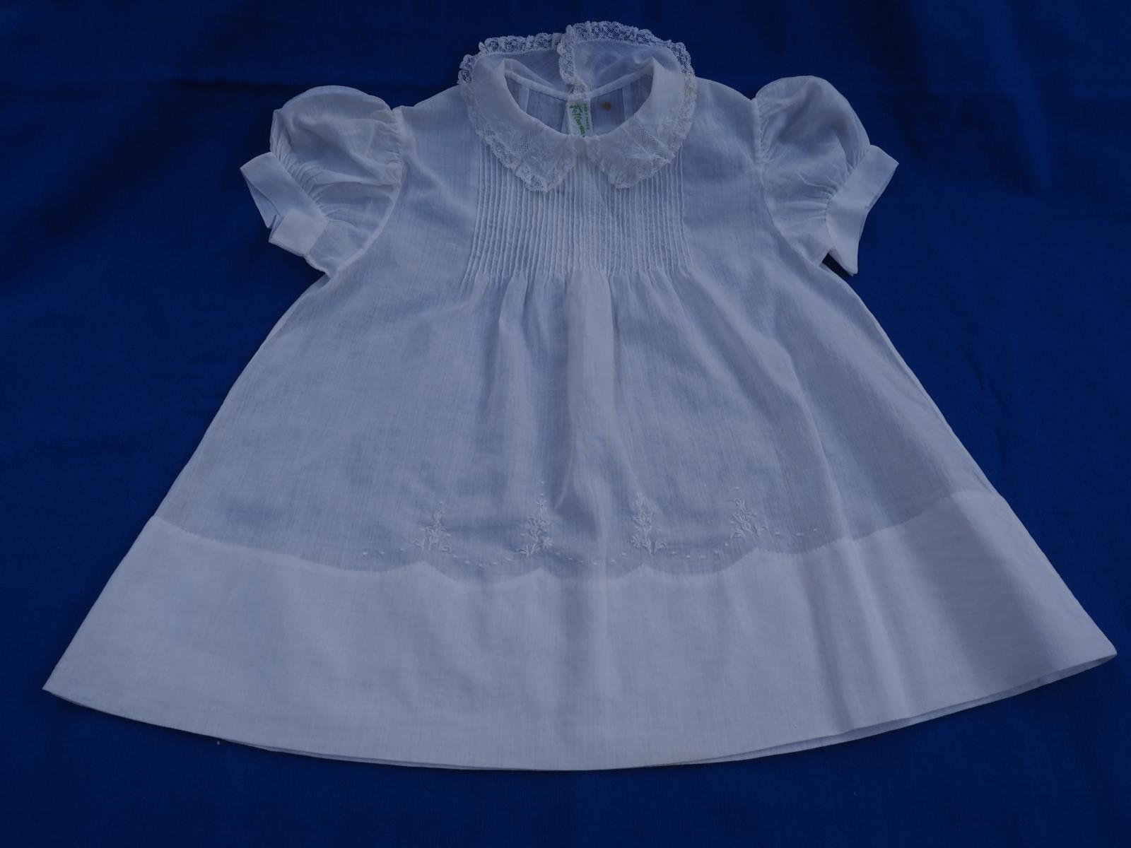 Baby dress in white work