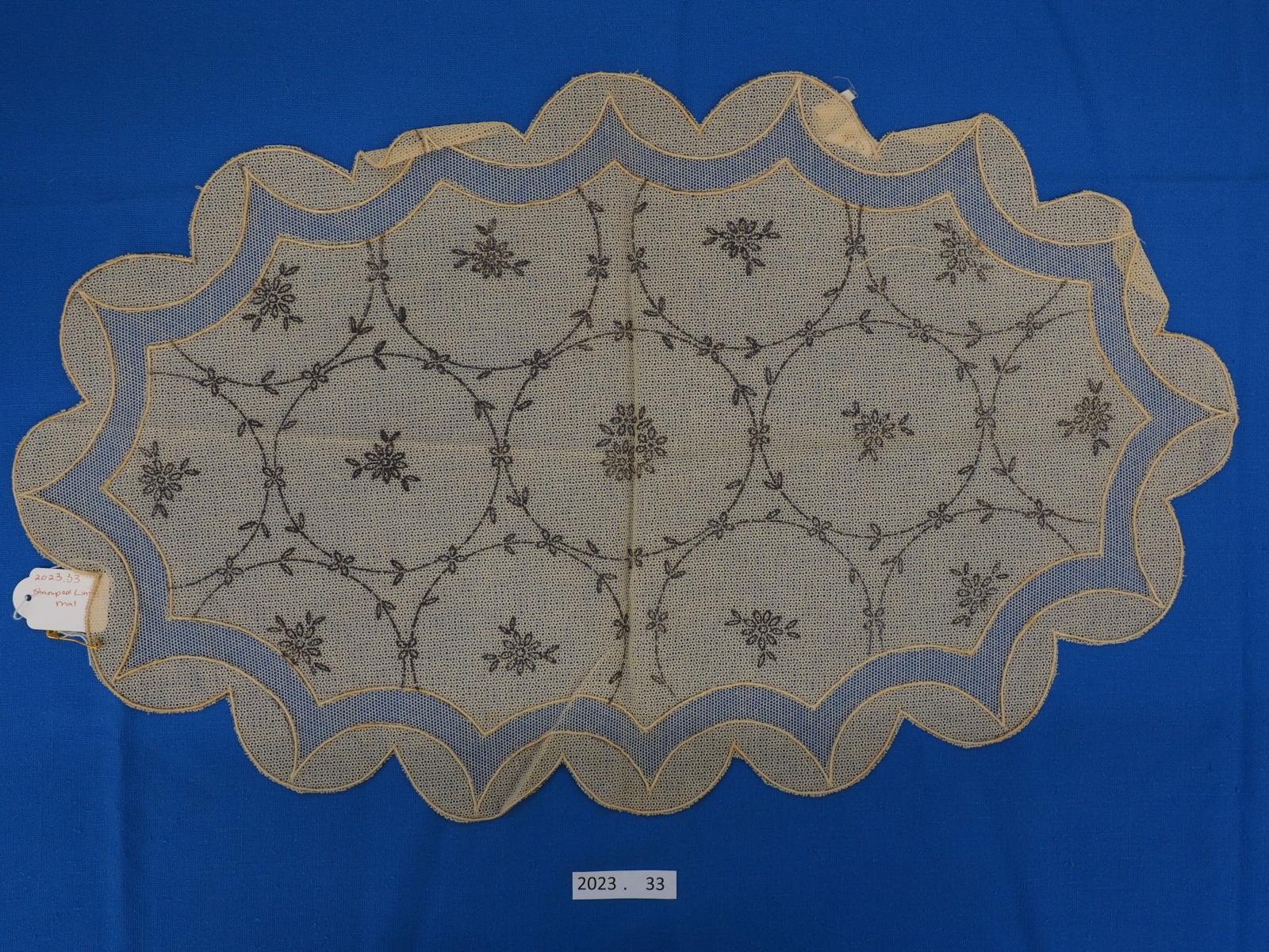 Stamped linen mat