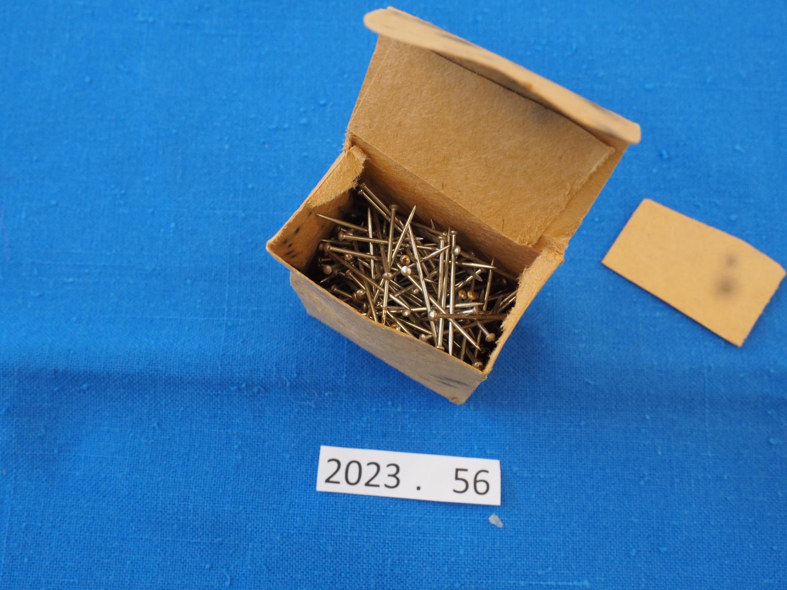 Open box of pins