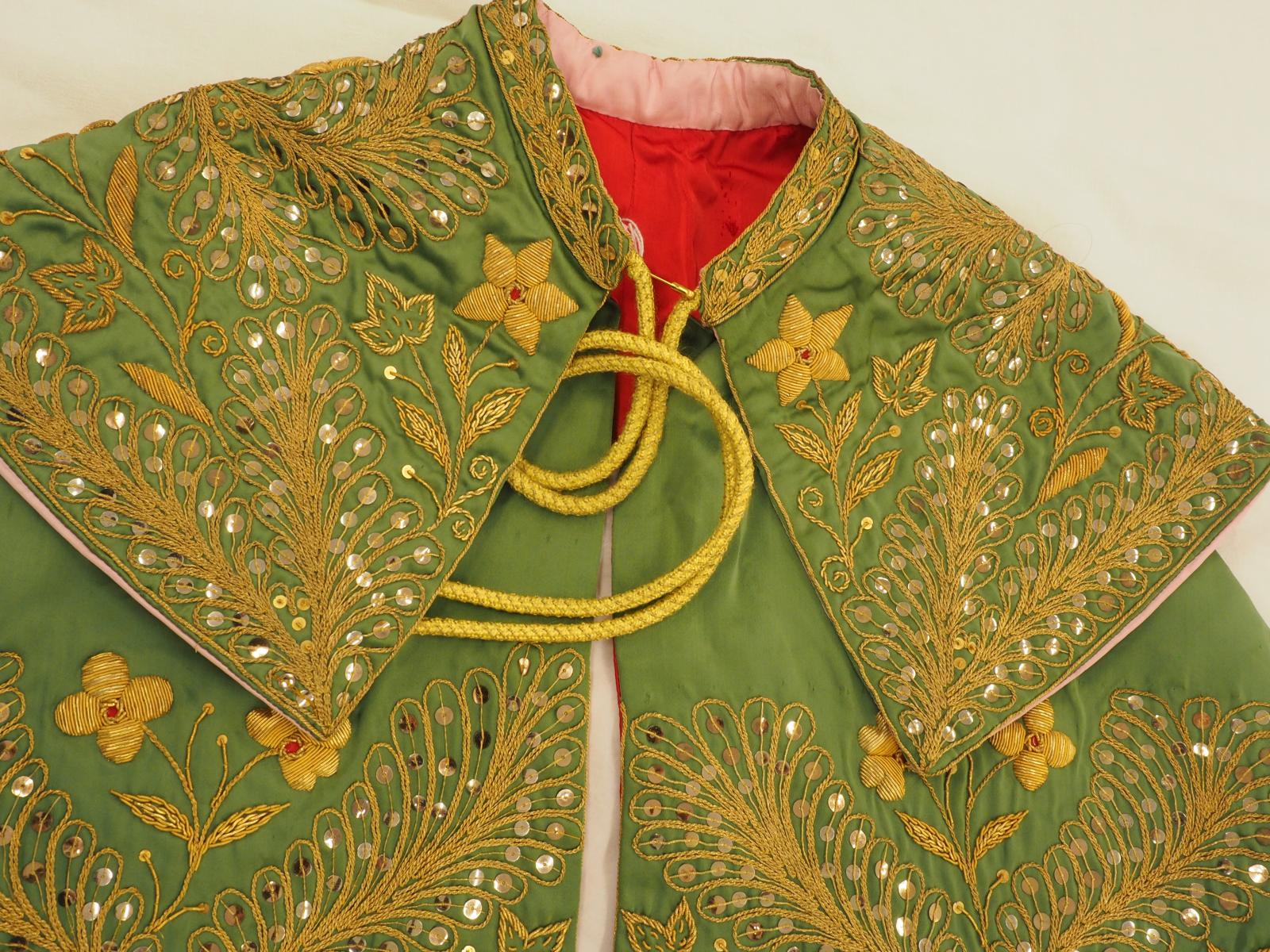 Gold work cape collar detail