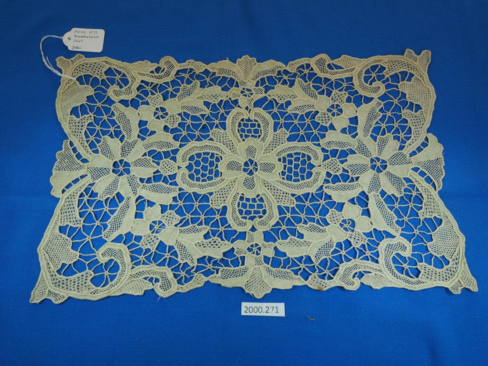 Needle lace mat