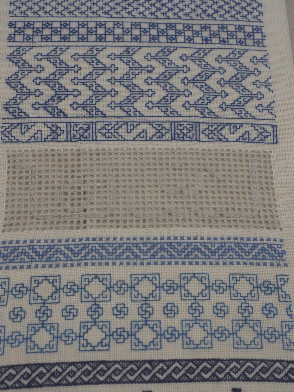 Embroidered sampler stitch detail
