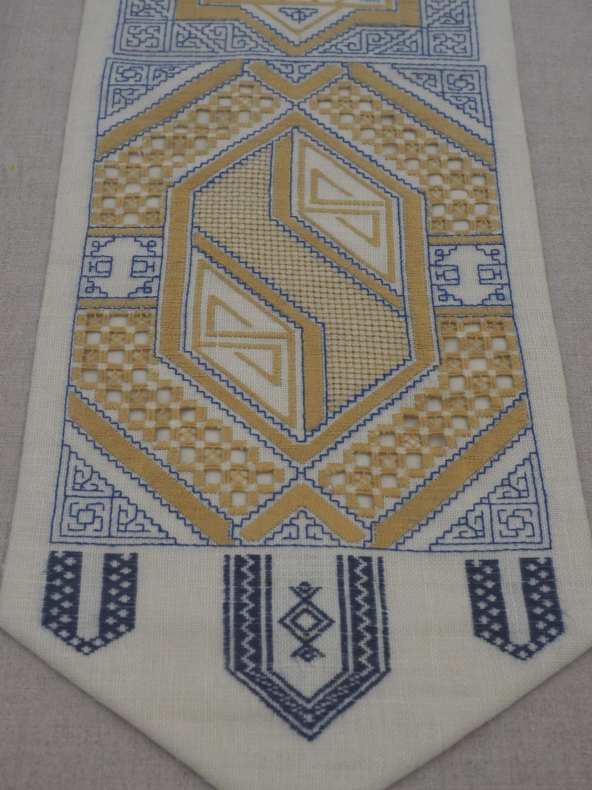 Embroidered sampler stitch detail
