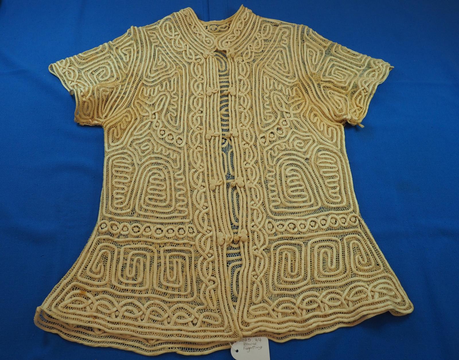 Blouse with rouleaux or fagotting
