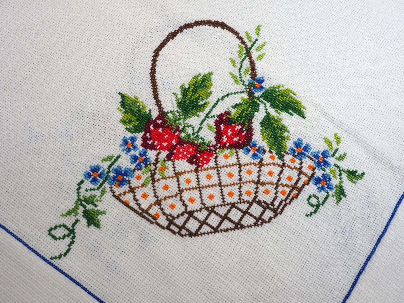 Detail of cross stitch table cloth
