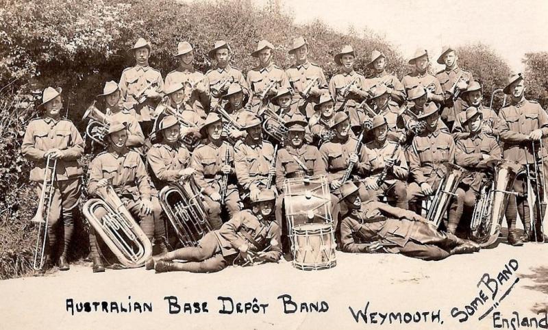 Group photo of military brass band with instruments