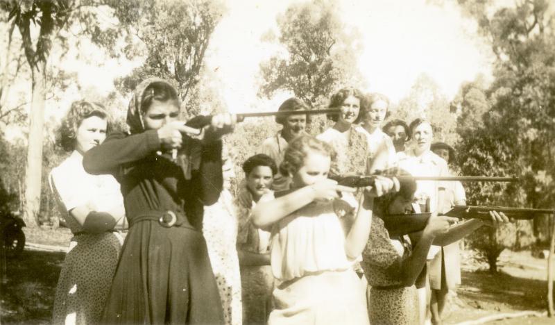 Rifle practice, by members of the Armadale Women's Emergency Corps learning to fire a rifle.