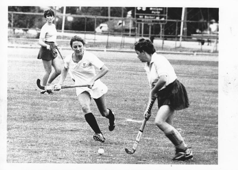 Women Playing Hockey