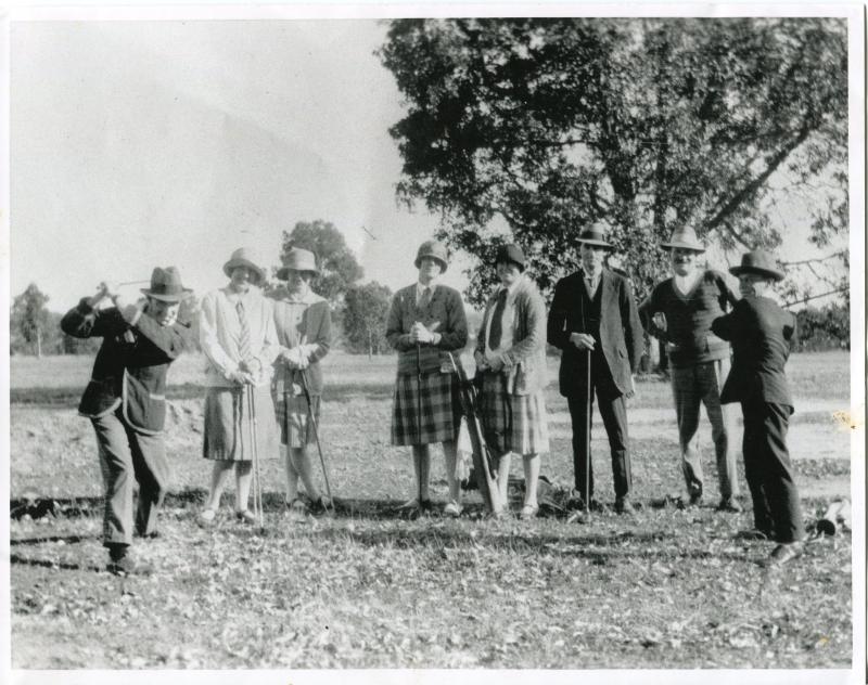 Group of People Playing Golf