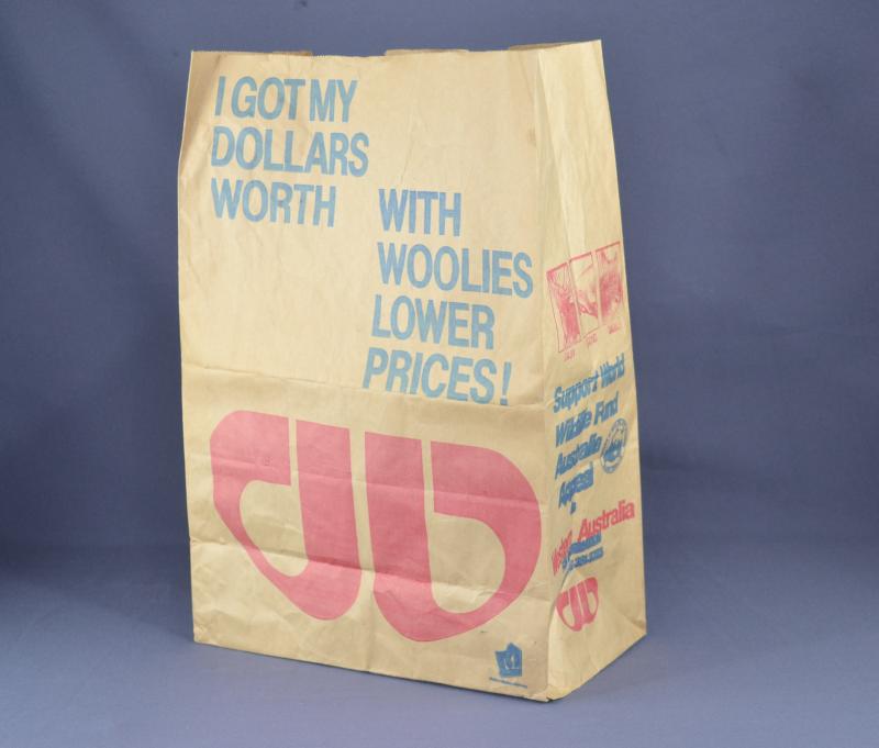 Wollworth's brown paper branded grocery bag