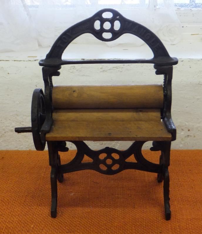 A small mangle used by children