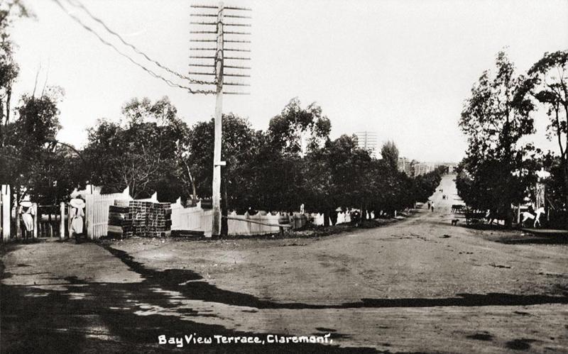 Black and white photo of a street. Text says Bay View Terrace, Claremont.