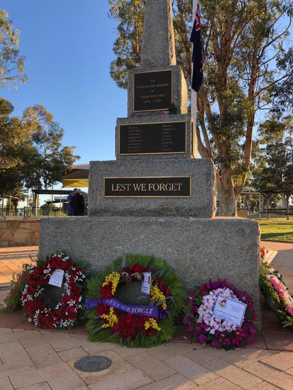 Photo of memorial with wreaths