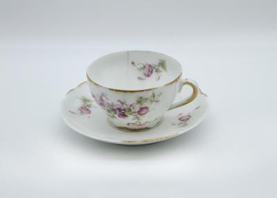 CHINA CUP AND SAUCER WITH PINK FLORAL DESIGN