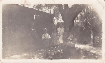 Photograph of family in the garden at Hillview Farm, South Greenough