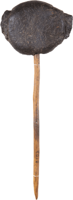 long piece of wood with a stone attached